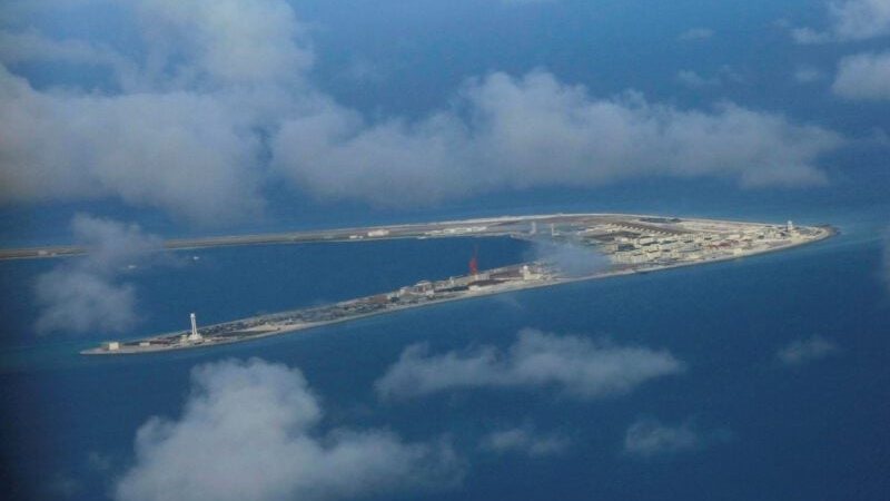 China Sends Naval Forces to Monitor US Warship Near Disputed Shoal