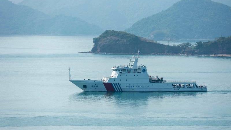 Chinese Coast Guard Monitors Philippine Vessel Resupplying in South China Sea