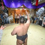 Foreign tourists get a grip on sumo beyond ringside