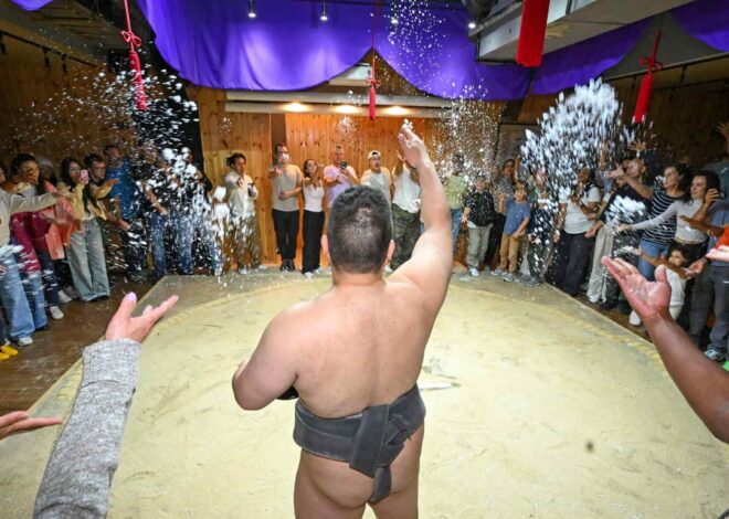 Foreign tourists get a grip on sumo beyond ringside