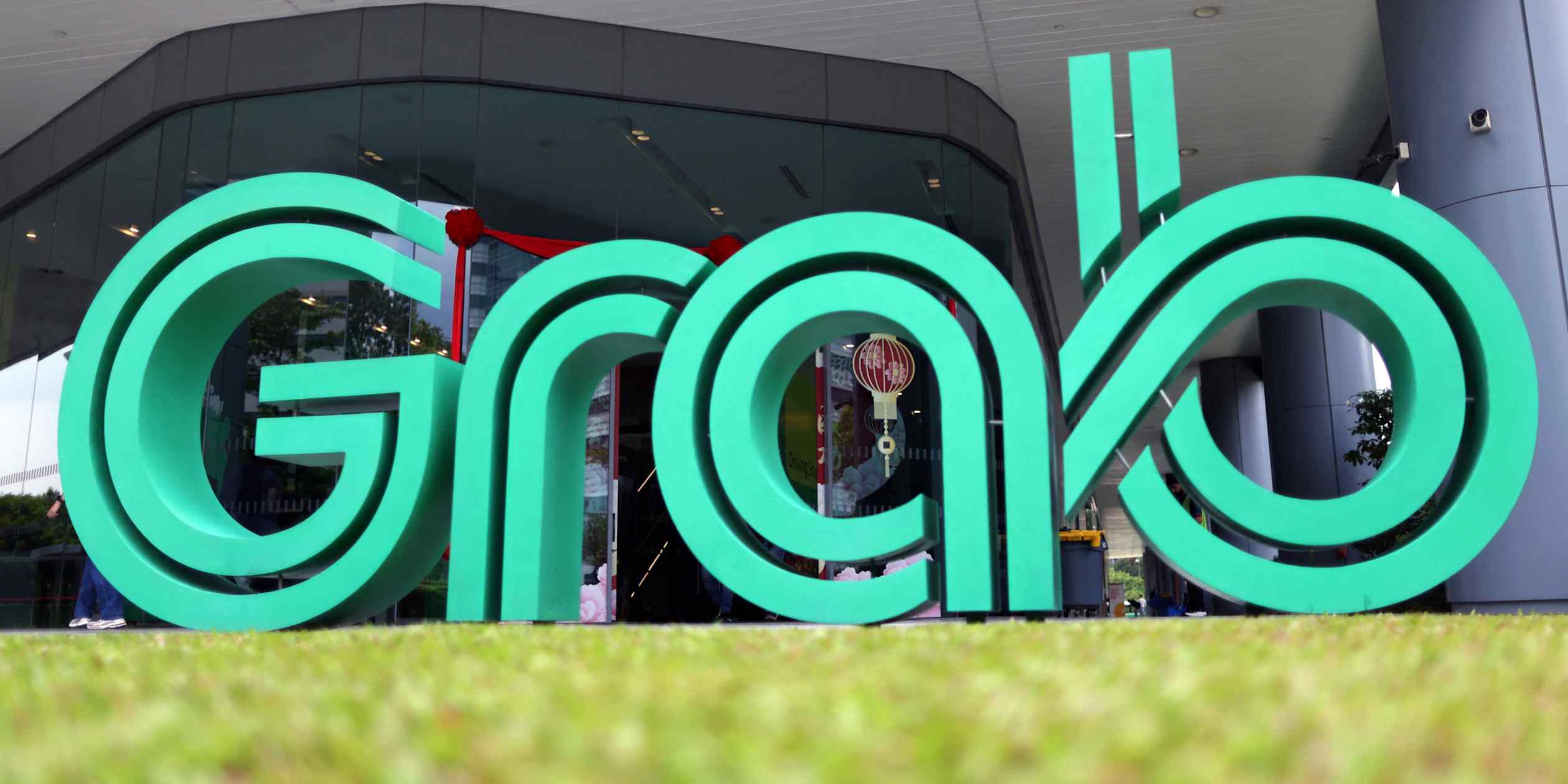 Grab to accelerate EV rollout as fuel prices rise