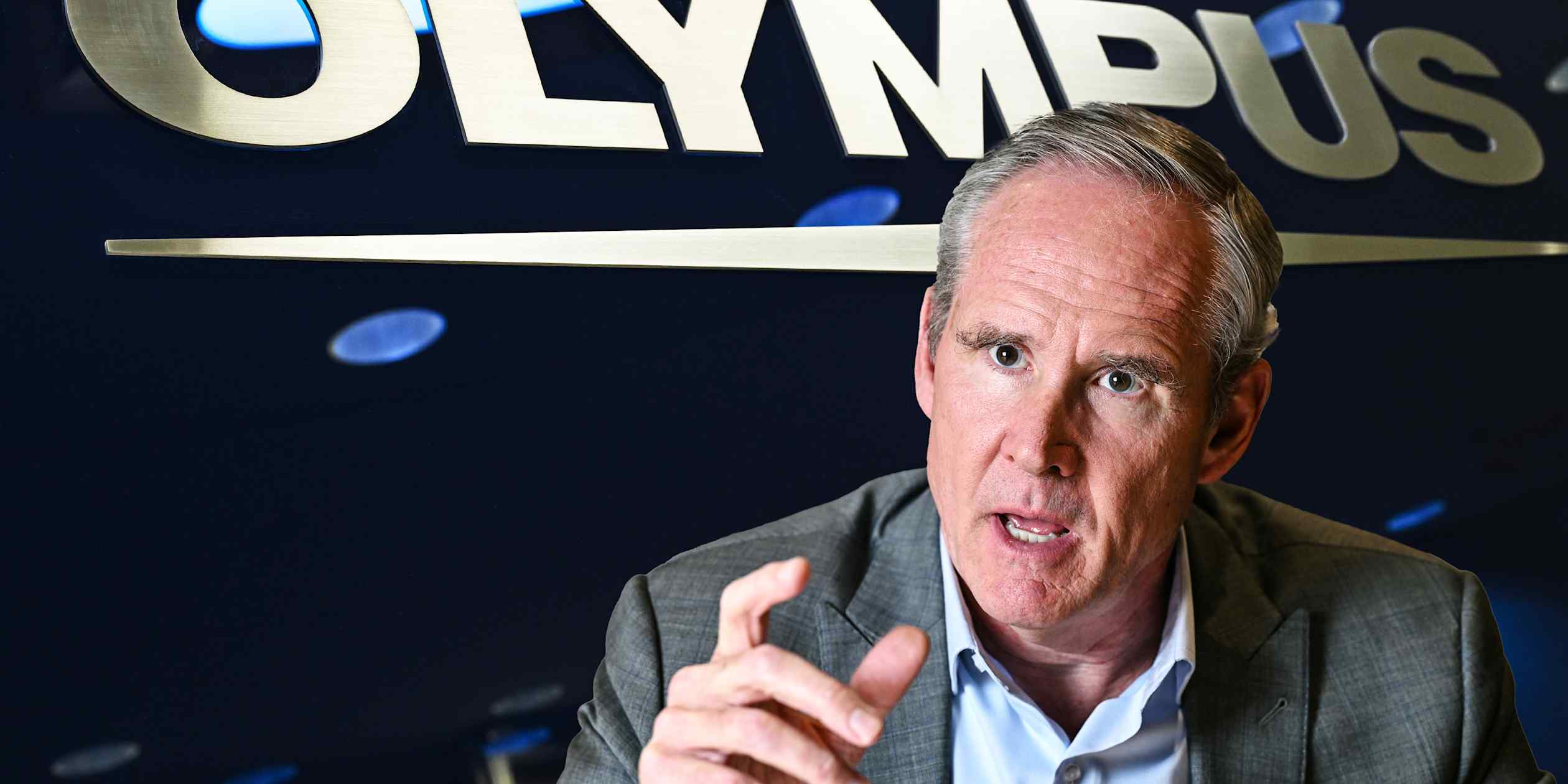 Olympus CEO marks turbulent first year with 20% share price jump