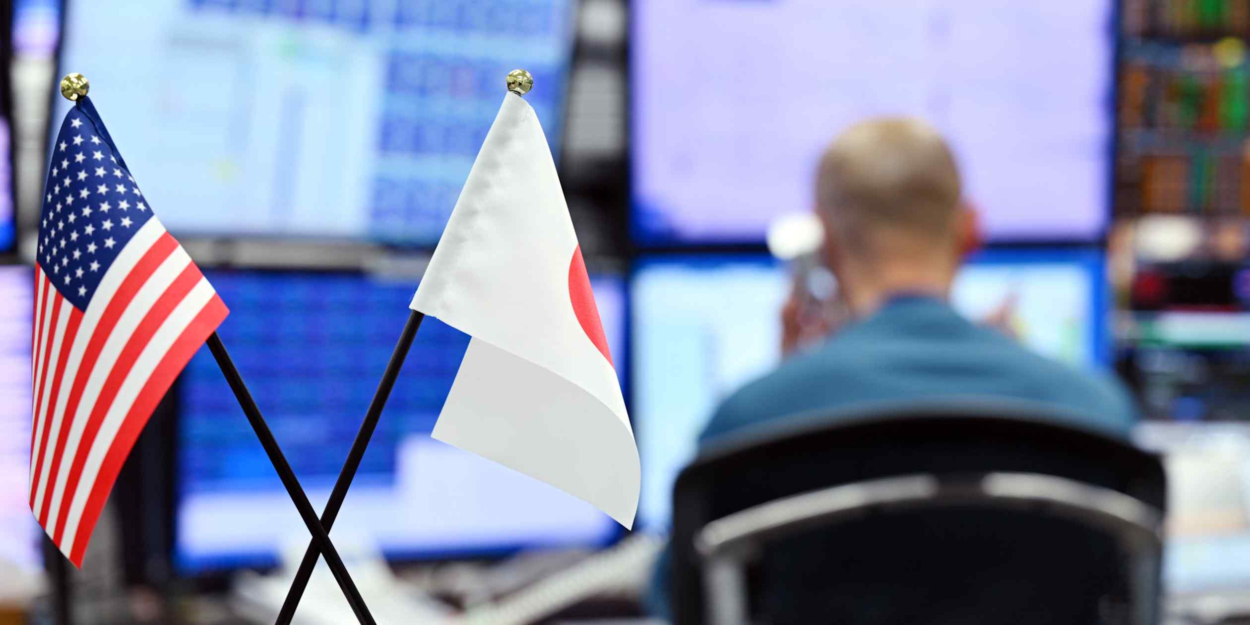 Yen surges to the high 155-range against dollar in thin holiday trading