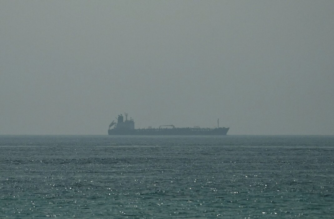 IMO Urges Ships to Avoid Hormuz as U.S. Strikes Iran Over Vessel Attacks Oil tanker Al Shaffiah sails at the sea near the Omani coast, as seen from Musandam