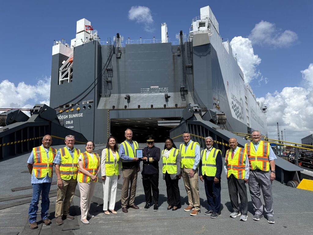 Members of the Port Freeport Commission, Executive Director and CEO Phyllis Saathoff, representatives from Höegh Autoliners, Mitsubishi Motors North America and AMPORTS, along with the Master of the Höegh Sunrise, commemorate the vessel’s inaugural call to Port Freeport with a plaque presentation at Berths 1 and 2 on Wednesday, July 1, 2026.