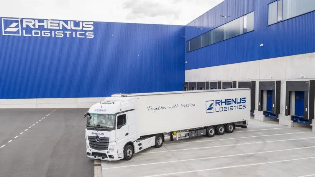 Rhenus reminds UK exporters of new EU customs charges on low-value parcels Rhenus vehicle departing a UK logistics facility, supporting cross-border supply chain operations and customs-managed deliveries between the UK and EU. Credits: Rhenus SE & Co. KG
