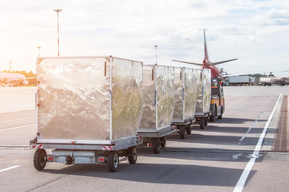 SAL to provide ground handling for SF Airlines ULDs being transported on airport runway