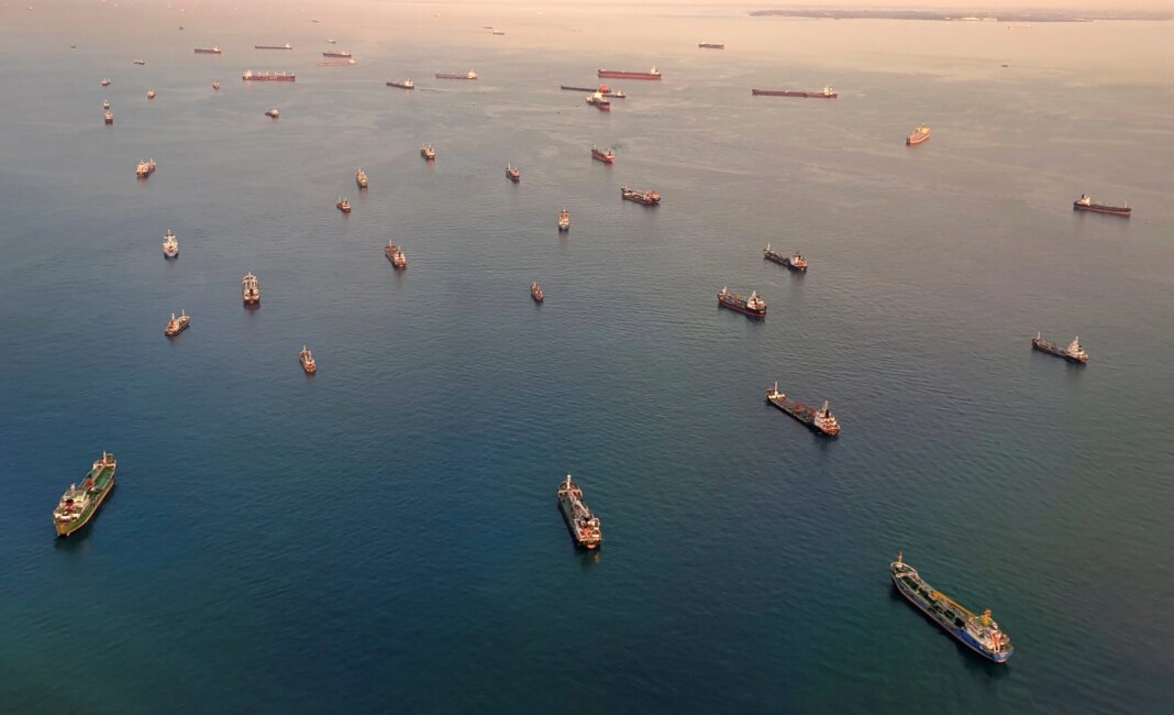 Singapore and Indonesia Sign Carbon Credits MOU, But the Real Work Is Still Ahead An aerial view of vessels in the Singapore Strait