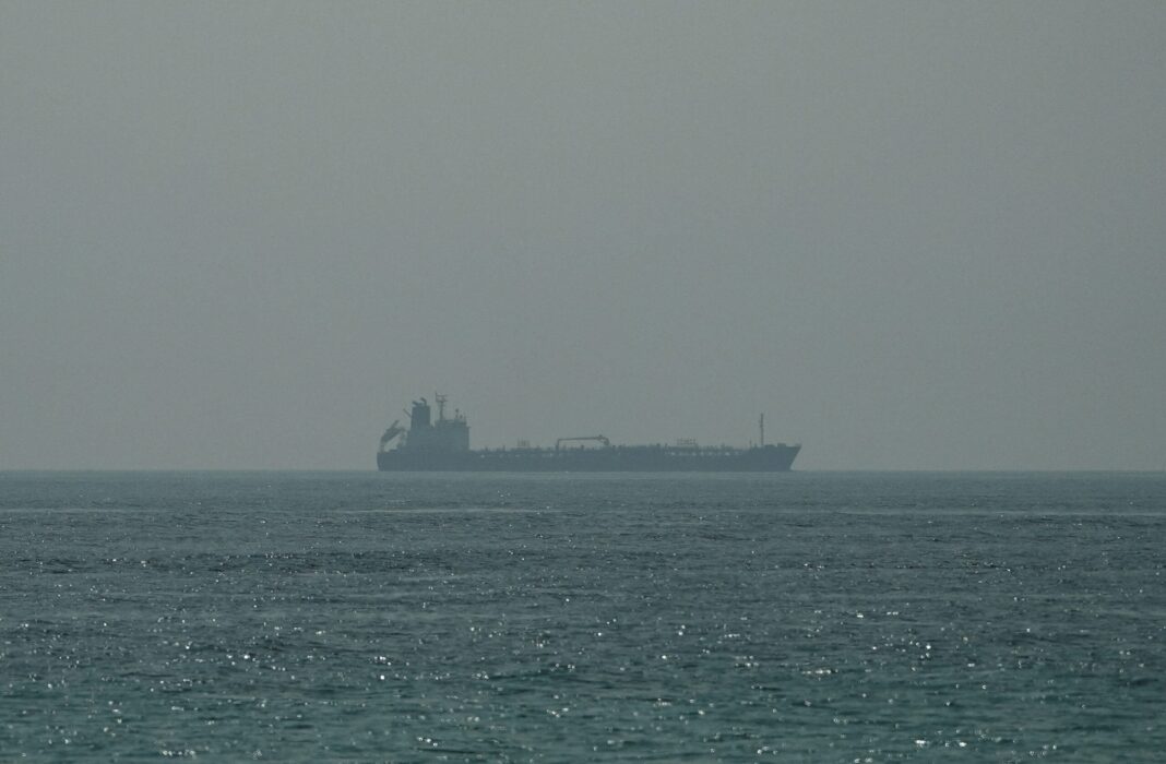 Tanker Struck by Projectile Near Hormuz, Sparking Fire Oil tanker Al Shaffiah sails at the sea near the Omani coast, as seen from Musandam