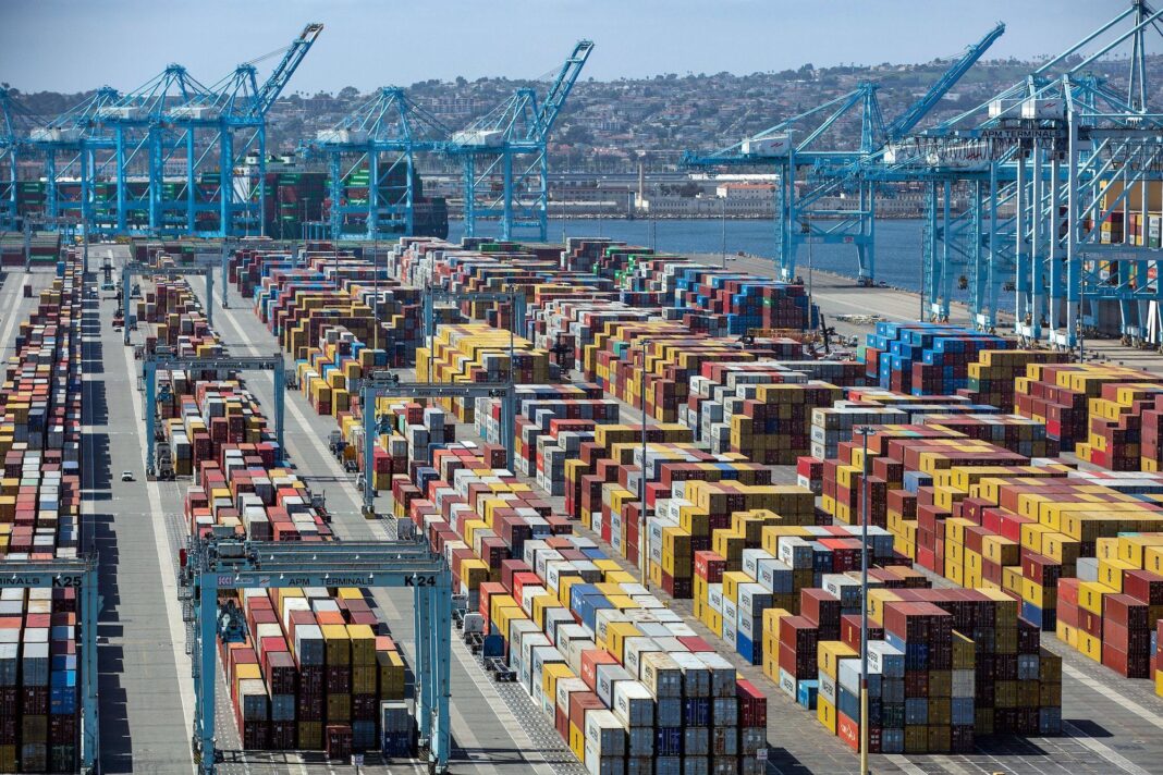 Los Angeles and Long Beach Post Strong June as Retailers Frontload Imports Cargo containers pile up at a marine terminal at the Port of Los Angeles.